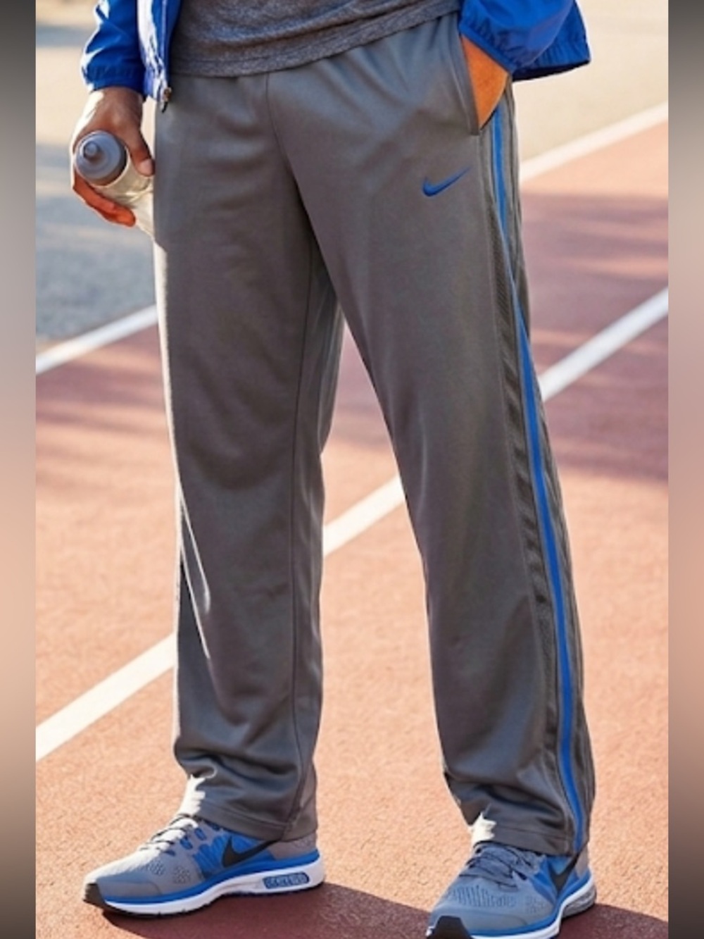 Nike Men’s Gray Sweatpants with Blue Side Stripe Size Medium